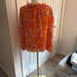 1. State floral top with semi cold shoulder. Photo 2