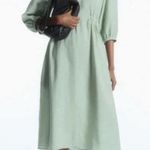 COS  voluminous v-neck light green midi dress, size 8 Photo 1