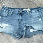 Aeropostale  Distressed Blue Jean Shorts are a size 1/2. Photo 0