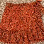 Urban Outfitters heart print, bow tie side, ruffle mini skirt Photo 2