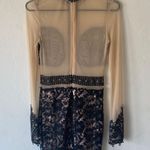 A'Gaci tan and black sheer long sleeve mini dress with embroidered detail Photo 8