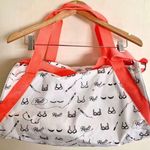 Benefit cosmetics over night duffel bag White Photo 1