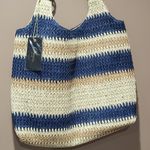 Tan and navy blue striped woven straw tote shoulder bag Photo 1