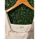 Free People We The Free Secrets Tee Tank Sz Large NWOT Cream Floral Cropped Photo 1