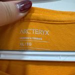 Arcteryx Womens Shirt XL Orange Athletic Performance Short Sleeve Polyester Photo 1