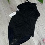 Holipick NWT One Piece High
Neck Criss
Cross Swimsuit Tummy black XS Photo 4