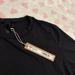 SKIMS  fits everybody tshirt black size medium Photo 1