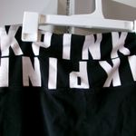 PINK - Victoria's Secret  pink all over band leggings in black and white size medium. Photo 3