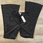 Urban Outfitters NWT Black Sparkly Flare Velvet Pants Size Small Photo 0