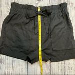 Socialite  Black High Waisted Tie Front Pocket Shorts. Size Large. Photo 4