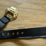 Black belt with gold buckle Photo 0