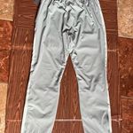 New Balance woman's sports Joggers with zips at bottom Size Large Photo 1