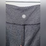 Athleta  Criss Cross Drifter Legging Size XS Gray Black Zip Pockets Photo 4