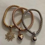 3 Piece Shiny Multilayer Gold Silver and Bronze Bracelet Set Photo 1