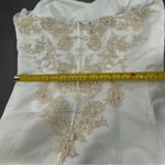 David's Bridal . Style T8818 size 10 wedding dress. 
Worn once. Was cleaned. Photo 6