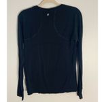 Athleta  Black Longsleeve fitted athletic top size large Photo 2