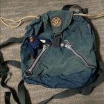 Kipling Women Vintage  small navy and light brown backpack  monkey still attached Photo 1