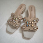 JustFab . Avelyn Cut Out Slide 8 Product Description Material: Faux Leather Heel Height: 1.0" Platform Height: N/A Measurements will vary slightly Imported Photo 4