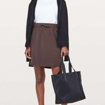 Lululemon  On The Fly Skirt *21" Sz 2 Black Satin Photo 0