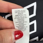 Nike  Size XS Sports Bra Swoosh Racerback Spellout Front Logo Pullover Stretch Photo 9