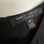 Romeo + Juliet Couture Sheer Lace Panel Cut Out Short Sleeve Jumpsuit. Photo 2