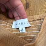 Chic Mable Tan Jumpsuit with crisscross open midriff with tie back. Size M Photo 3