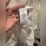 NWT Rubienn Eyelet Tired Back Tie Frill Mini Dress In Off White Photo 11