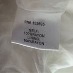 Koko + Mason White Cropped Wrap Top 3/4 sleeve snap v Photo 9