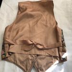 Unique vintage 90s tapestry vest with a funky, multi Photo 2