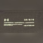 Under Armour Women’s capri leggings - black & rose gold - large. Thigh pockets. Photo 3