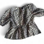 Amazon  Cheetah Peplum Print Top with Tie Front  Photo 4