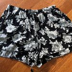 Brandy Melville White and Black Flowy Shorts  Photo 0