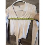 Free People Deep V-Neck Long Sleeve Bodysuit Light Pink Size XS Ballet Pilates Photo 5