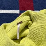 Free People bright long sleeve bright colored sweater dress
Women’s size small Photo 3