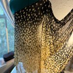 Julie Brown One-shoulder dress with a golden and black abstract print. Lightweight, flowy, Photo 4