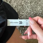 All In Motion one piece Photo 3