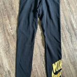 Nike Black Leggings with Gold Logo Photo 1