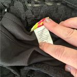 Wildcat size small black lace top with ruffle detail Photo 2