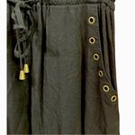 Forever 21  black dress with brass embellishments, pockets in the front size S Photo 3