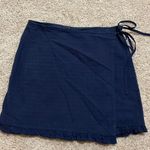 Fashion On Earth  Navy Blue Wrap Mini Skirt. Photo 0