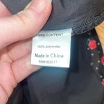 Princess Polly NWT black floral mini dress Photo 4