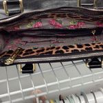 Betsey Johnson Betsy Johnson feaux black leather quilted bag with leopard print Photo 1