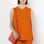 ZARA  Orange top with side buttons size XS Photo 1