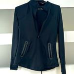 Under Armour Women’s UA running layer. Excellent used condition. Size M Photo 1