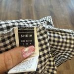 SheIn women's babydoll peplum plaid blouse with long puff sleeves and a bow tie front Photo 2