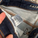 American Eagle outfitters dark wash distressed super skinny jeans size 6 Photo 3