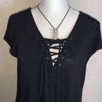 Polly & Esther Boutique purchase from Nashville, TN. Lace up front. Flows, high low hem. Photo 1