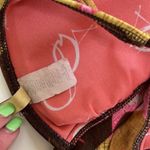 Hobie  tie bikini top.  Size Medium.  Padded cups.   Wood embellishment. Photo 5