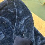 Cozy Casual Soft and plush blue fleece hoodie with a front pocket. Perfect for staying warm and comfortable. Just needs to be lint rolled or thrown in dryer.  Photo 4