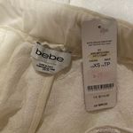 Bebe NEW  Sequin Joggers in White Extra Small Photo 4